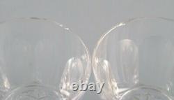 Baccarat, France. Seven Art Deco white wine glasses in crystal glass