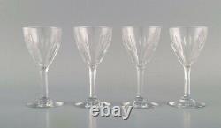 Baccarat, France. Seven white wine glasses in clear mouth-blown crystal glass